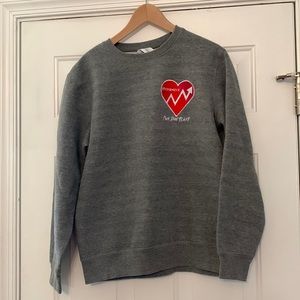 Threadfast dark gray sweatshirt with stitched on patch.